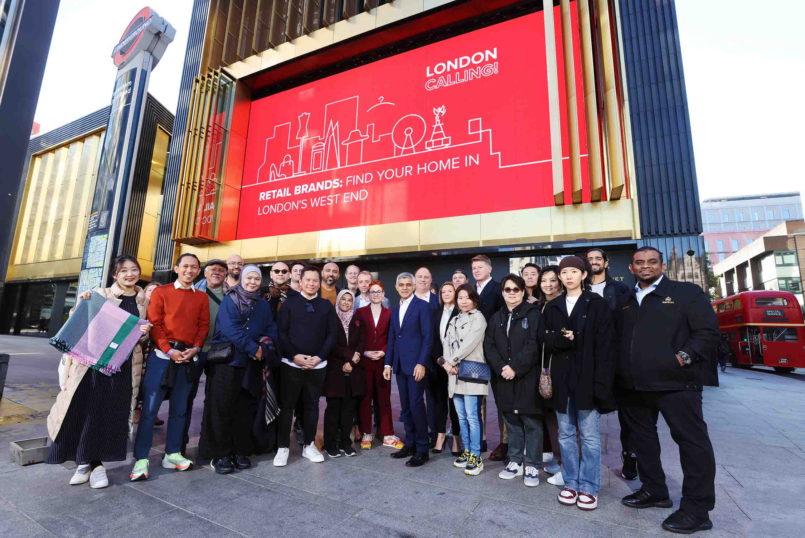 Mayor of London Sadiq Khan with representatives from retail brands standing in front of The Now Building