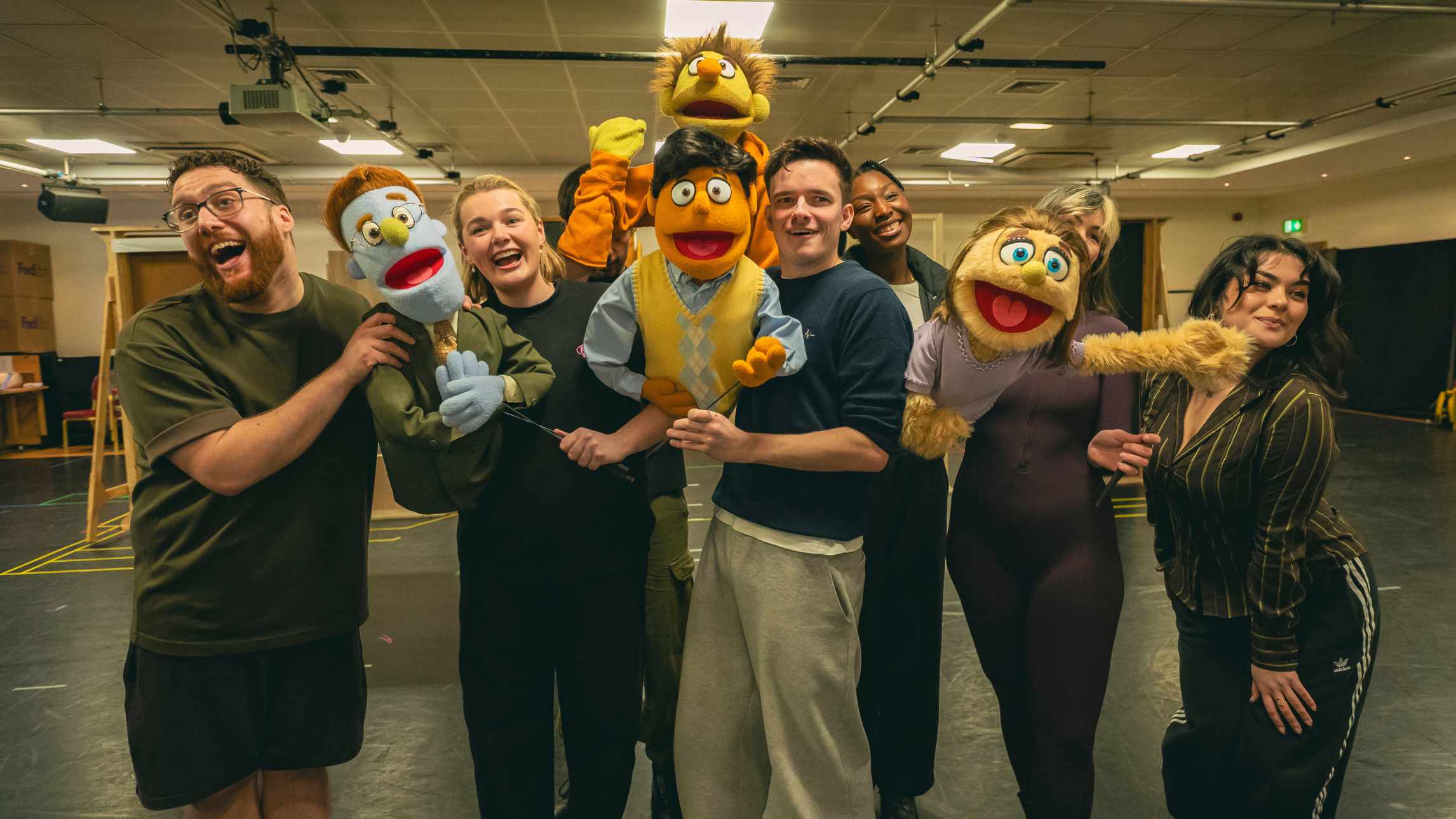 The cast of Avenue Q at The Shaftesbury Theatre, London