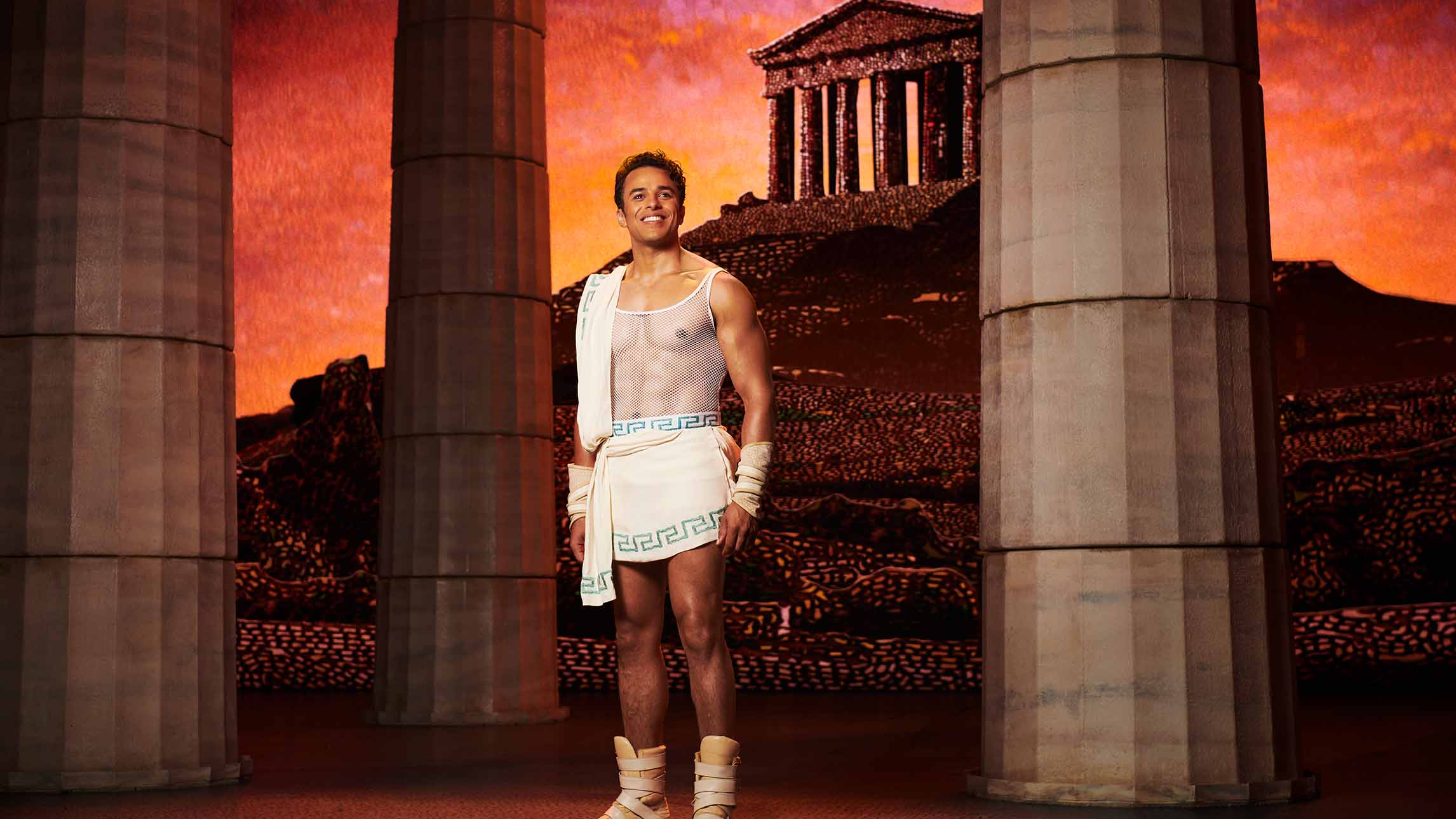 Luke Brady (Hercules) on stage in Disney's Hercules