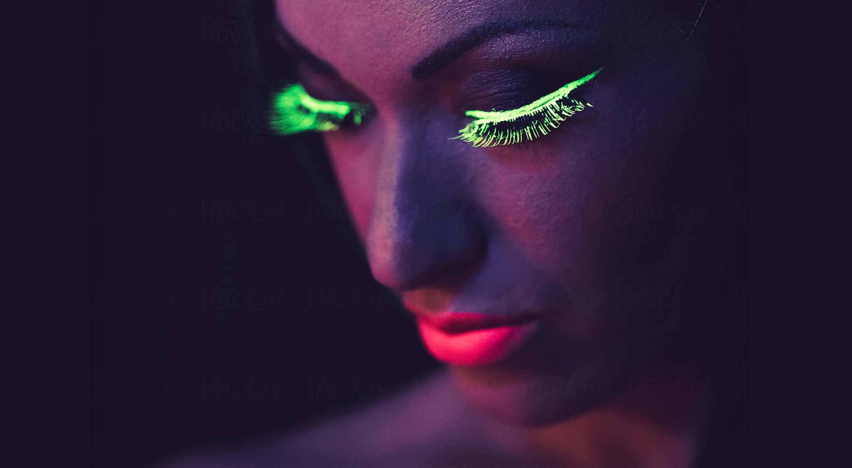 Woman wearing neon makeup