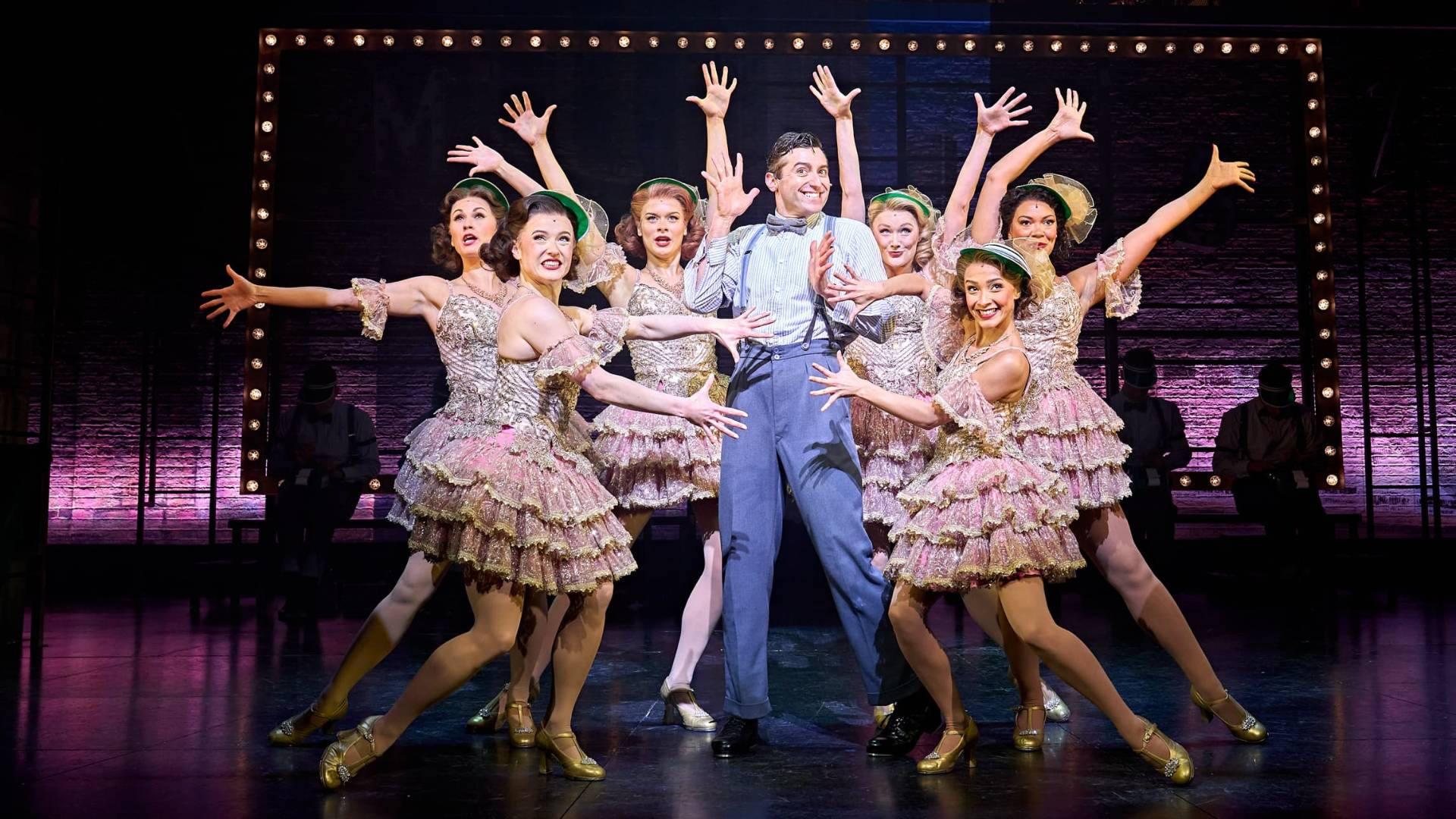 The Producers cast on stage